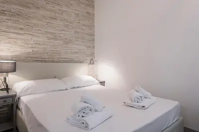 Letto o letti in una camera di Apartments Florence-Masaccio apartment