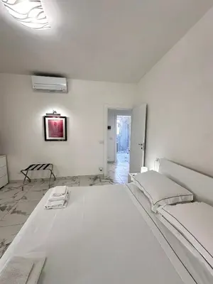 Letto o letti in una camera di a casa di Luca