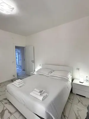 Letto o letti in una camera di a casa di Luca