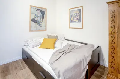 Letto o letti in una camera di Centro storico - Leopoldo Apartment