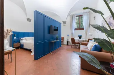 Letto o letti in una camera di Vittoria Suite