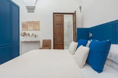 Letto o letti in una camera di Vittoria Suite