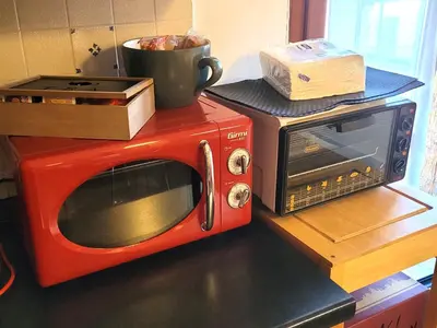 Cucina o angolo cottura di Firenze homeaway - Pape's cozy apartment, near Airport - 14 min from city center-10 minutes walk from the Baker Hughes