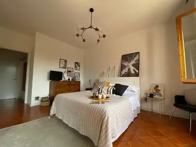 Letto o letti in una camera di Rosymarty Apartment-vicino Firenze