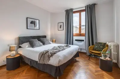 Letto o letti in una camera di Apartments Florence- Accademia Charme