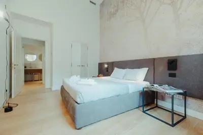 Letto o letti in una camera di Bufalini Boutique Apartment