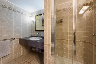 Bagno di Residenza del Bravo by Mmega