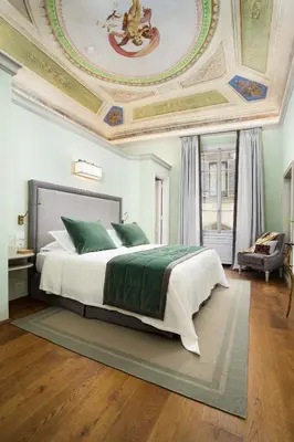 Letto o letti in una camera di Conte Jacopo - La Dimora degli Affreschi Florence