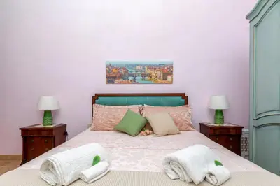 Letto o letti in una camera di Lovely Apartment Piazza della Signoria