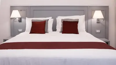 Letto o letti in una camera di Wine Apartments Florence Bolgheri